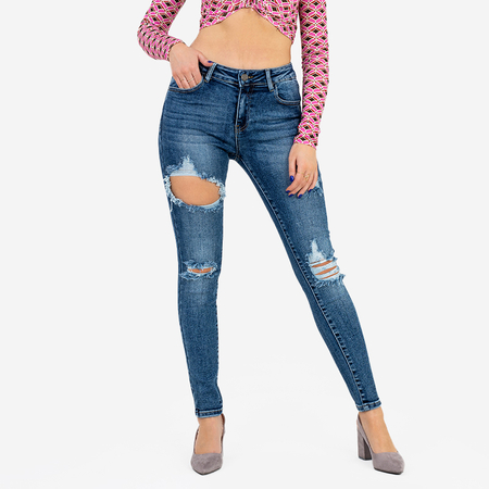 Granatowe jeansy damskie rurki z dziurami - Odzież