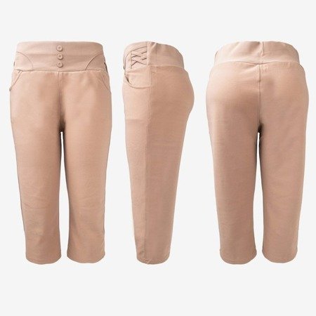 Jasnobrązowe legginsy krótkie z guzikami - Odzież