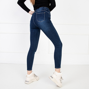 Granatowe damskie jeansy typu rurki - Odzież