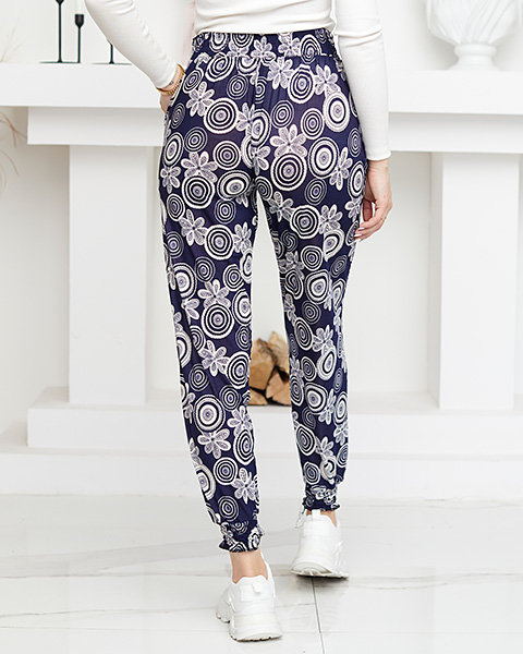 Granatowo- białe wzorzyste damskie spodnie materiałowe- Odzież