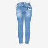 Niebieskie jeansy damskie z dziurami PLUS SIZE - Spodnie