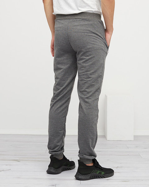 Szare męskie spodnie dresowe z zasuwanymi kieszeniami - Odzież