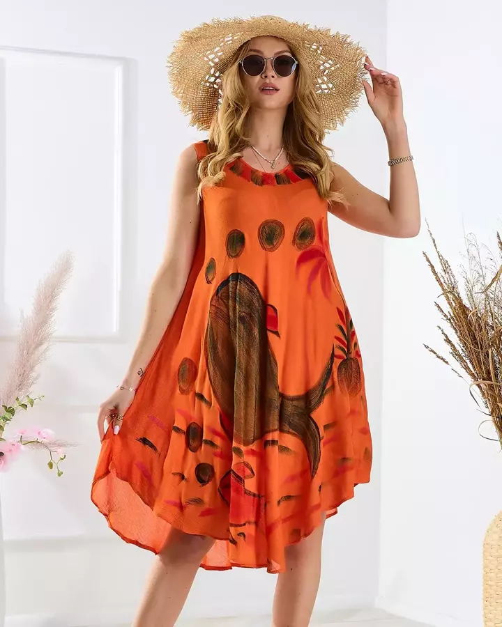 Пляжна помаранчева сукня-спідниця з яскравим принтом - Одяг