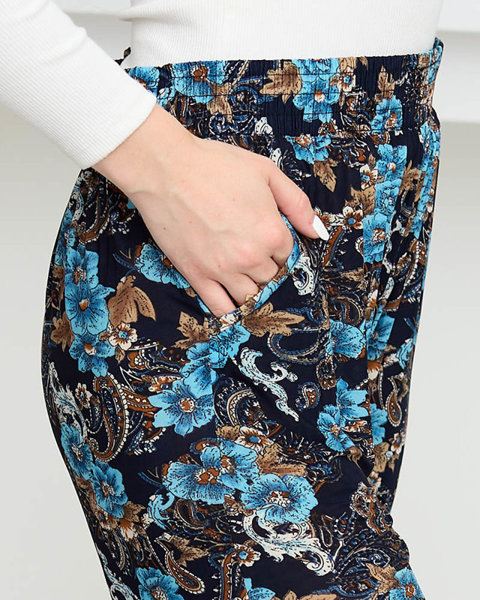 Темно-сині та бірюзові жіночі штани з квітами PLUS SIZE - Одяг